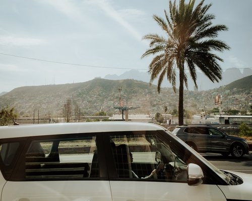 Varying sitting posture inside a local commuter vehicle in Monterrey